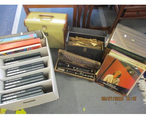 Mixed records to include a gramophone and late 20th century 45 rpms, a cased clarinet and box set of LPs 