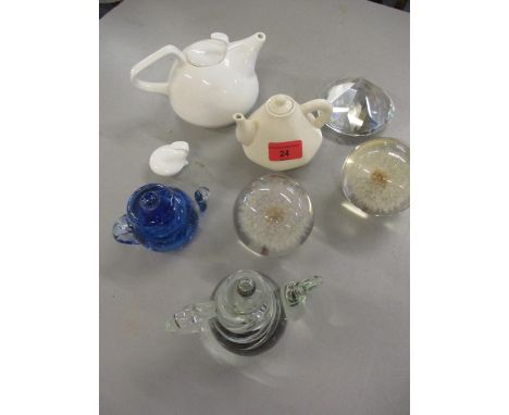 Paperweights to include two in the form of teapots, together with two ceramic teapots 