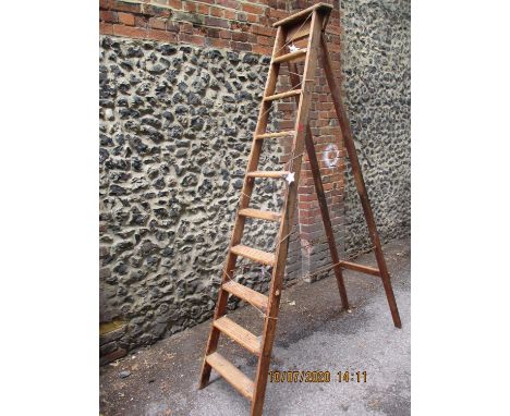 A 1930s 8' wooden ladder 