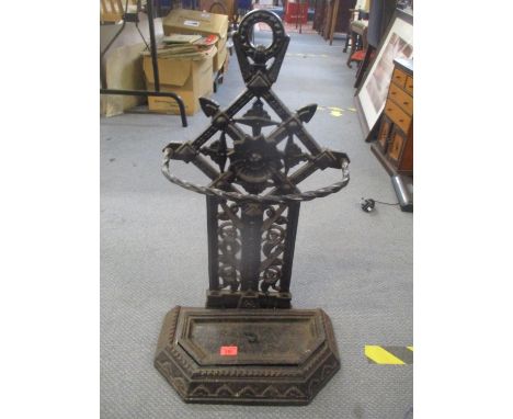 A 19th century cast iron stick/umbrella stand with drip tray 