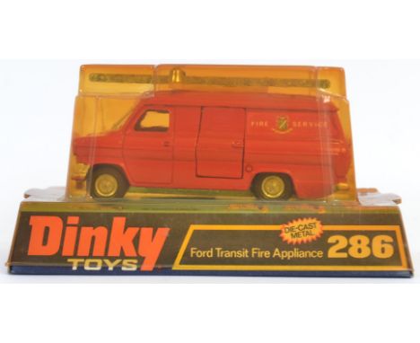 DINKY: An original vintage Dinky Toys diecast model Ford Transit Fire Appliance 286. Appears to still have the original tape 