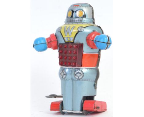 1950's TIN PLATE ROBOT: A fantastic c1950's / 1960's clockwork tinplate ' Made In Hong Kong ' robot. Brightly litho printed t