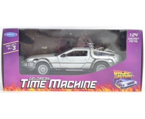 BACK TO THE FUTURE: An original well detailed Welly 1:24 scale boxed diecast model Back To The Future Delorean. Mint, boxed. 