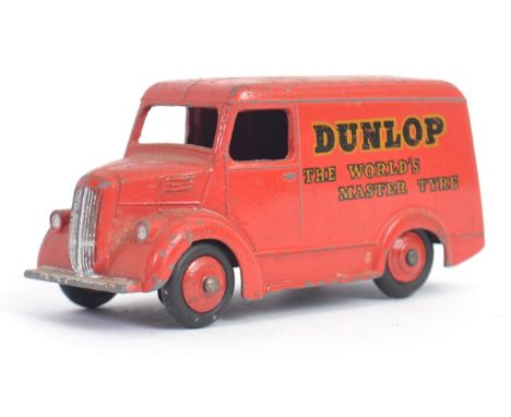 DINKY: An original vintage Dinky Toys diecast model Trojan Dunlop ' The Worlds Master Tyre' advertising van, in red, with red