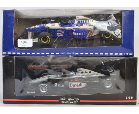 MINICHAMPS: 2x 1:18 scale diecast model Pauls Art Model Formula One racing cars - each within the original boxes. 