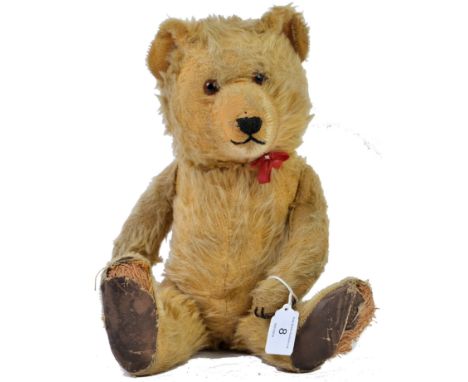 CHILTERN; An original 1930's Chiltern ' Growler ' teddy bear. With original leather pads, glass eyes. Approx 12" tall. 