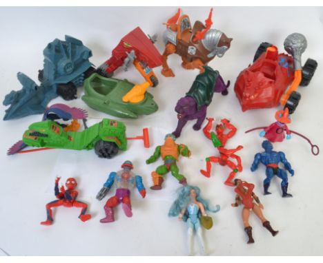 MASTERS OF THE UNIVERSE: A collection if vintage Mattel Masters Of The Universe action figures and vehicles.