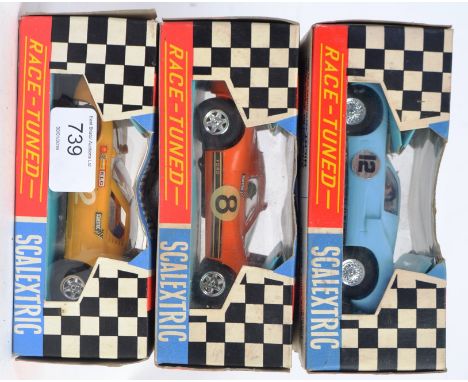SCALEXTRIC: A collection of 3x vintage Scalextric ' Race Tuned ' racing cars - C18 Ford 3L, c17 Lamborghini and C77 Ford GT. 