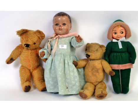 DOLLS: Two vintage dolls one a composition bodied and headed 1950's doll with clothing and an Andy Pandy style faced cloth do