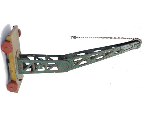 BING CRANE: An antique likely Bing, but unmarked, lithograph printed model of a train. Wheeled base, with original chain and 