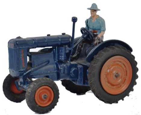BRITAINS FORDSON TRACTOR: An original vintage Britains diecast model Fordson Major Tractor and figure. Dark blue, with red wh