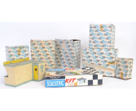 SCALEXTRIC: A collection of vintage Scalextric trackside accessories - most boxed - to include Power Unit, First Aid Hut, Fil