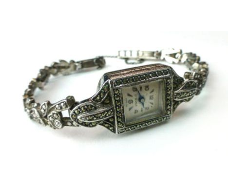 A silver ladies cocktail wristwatch, 17 jewel movement, marcasite mounted bracelet, stamped 'silver' to the back of the case.