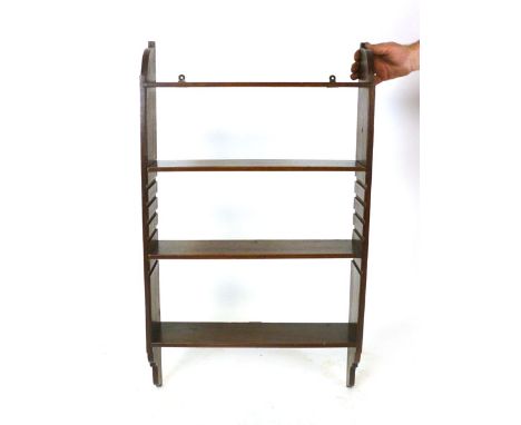 A Victorian mahogany hanging shelf unit, circa. 1870, with scrolling terminals and two adjustable shelves, h. 95 cm x w. 56 c