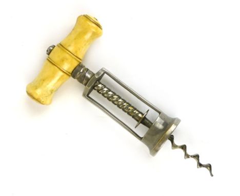 'The King', a steel corkscrew, patent 6064 with turned bone handle, length closed, 17 cm. CONDITION REPORT: Generally good, o