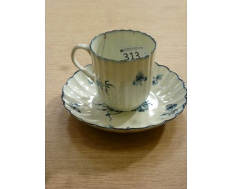A Caughley coffee cup and saucer late 18th Century, of fluted form blue decorated with a gillyflower design, diameter of sauc