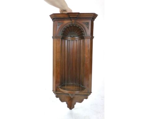 A late Victorian mahogany and line inlaid corner niche, dated 1898, moulded cornice above a shell carved niche and a scrollin