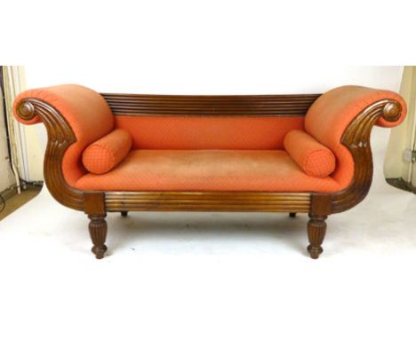 A Victorian-style mahogany scroll arm sofa with stylized foliate decoration. l. 192 cm. CONDITION REPORT: Needs re upholsteri