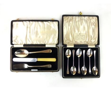 A cased set of silver coffee spoons, makers mark RP Birmingham 1933; together with a cased  silver christening knife, fork an