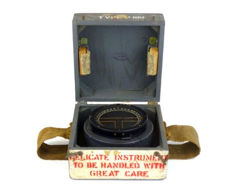 A Second World War period aircraft compass, type P8M, serial number 169587h, in its original grey painted wooden box. CONDITI
