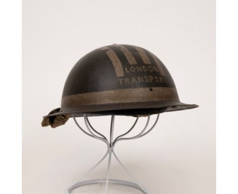 WWII Home Defence Steel Helmet for London Transport with original chin strap and liner but a replaced retaining screw for lin