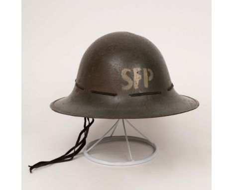 Three steel helmets, Home Front interest, two Zuckerman helmets, one National Fire Service, The Zuckerman Helmets both dated 