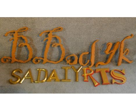 A collection of vintage wooden and gilded shop name letters. A mixture of fonts and sizes of letters. 50x43cm 