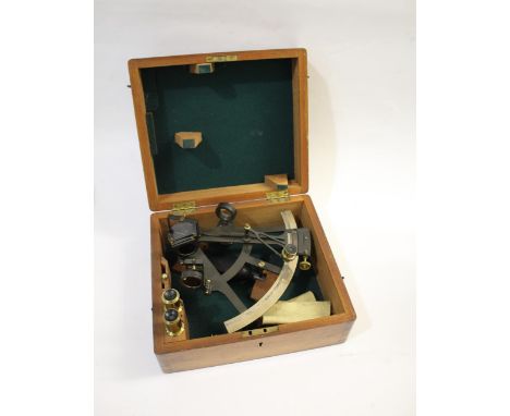 BOXED SEXTANT - NORIE &amp; WILSON a brass and metal sextant with silvered dial, in a fitted mahogany case and with accessori