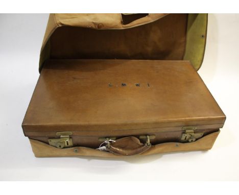 VINTAGE LEATHER SUITCASES including a leather case with brass locks, stamped with initials on the top and to an outer protect