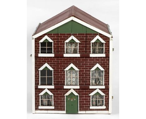 VICTORIAN DOLLS HOUSE a 3 storey house with attic rooms, with a brick facade and glazed windows with netting curtains. Access