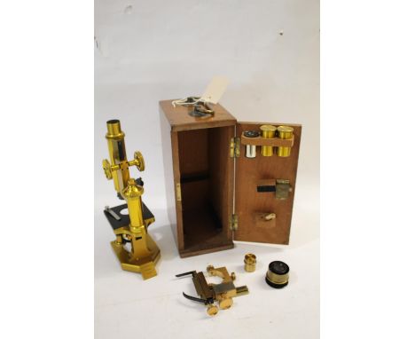 CASED MICROSCOPE - R &amp; J BECK a brass monocular microscope, with various lenses and accessories and in a fitted mahogany 