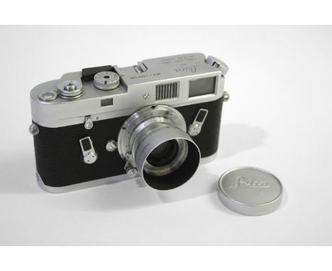 LEICA M4 RANGEFINDER CAMERA &amp; LENS a Leica M4 camera, Serial No 1209785 (1968-1969), with a Leitz GMBH Wetzlar Summaron f