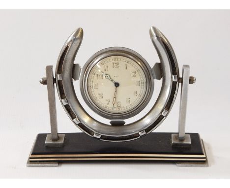 A horseshoe shaped eight-day Smiths mantel clock 