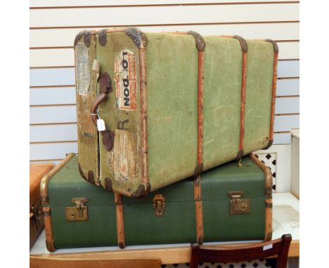 A canvas wood bound trunk bearing various labels, to include "Nelson Line" together with another similar trunk (2) 