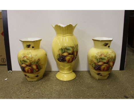 A quantity of Aynsley 'Orchard Gold' china to include vases, plates, two teacups and saucers etc. 