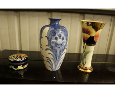 A Moorcroft style vase, similar trinket box; and one other vase