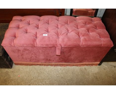 A button down upholstered ottoman 