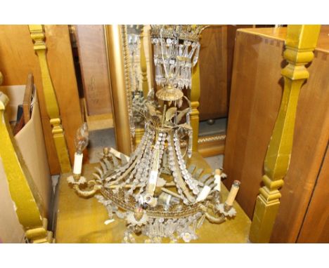 A brass and glass chandelier 