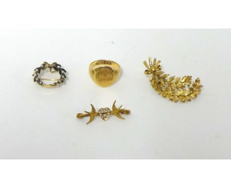 A 9ct gold floral scroll brooch, a 14k gold, pearl and enamel wreath brooch, a Victorian gold Love bird brooch and an 18ct go