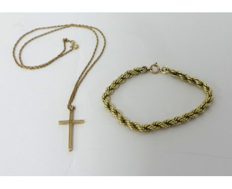 A 9ct gold rope twist bracelet and a 9ct gold crucifix pendant and chain, weight 11 grams.
