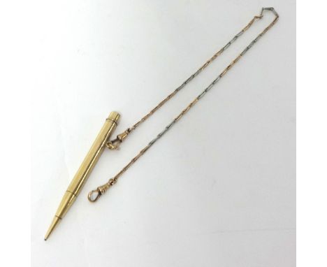 A 9ct gold propelling pencil to a 9ct white and rose gold watch chain, weight of chain 7 grams.