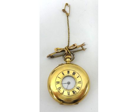 An Edwardian 18k gold half hunter ladies keyless wound pocket watch, the white enamel dial with Roman numerals, engraved back