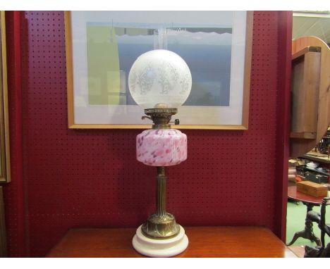 A Duplex English made oil lamp with etched glass globe shade over mottled glass reservoir, brass column to ceramic base, 68cm