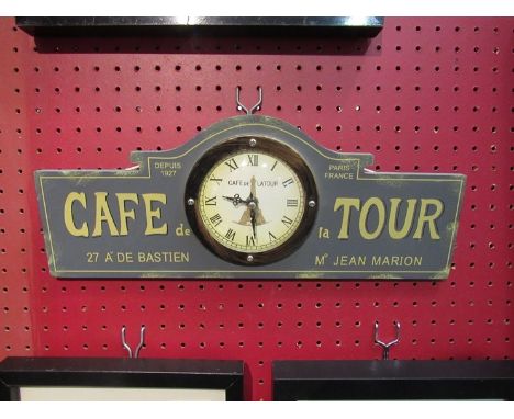 A "Cafe de la Tour" advertising wall hanging clock 
