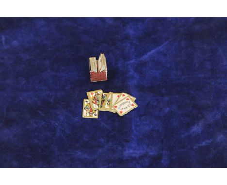A miniature pack of playing cards. 