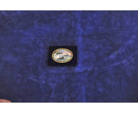 A miniature portrait of a lifeboat amongst crashing waves in a gilt mount and ebonised frame. 