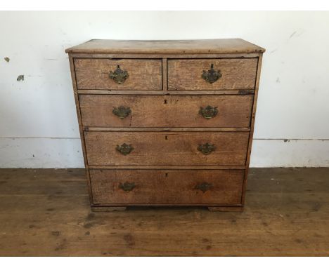 A 19th century oak chest of two short and three long drawers, on shaped bracket feet (af). 33ins wide.