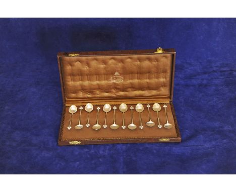 A set of twelve Swedish silver coffee spoons with triple orb form handles, stamped to the reverse of the bowls 'K8' for 1936 