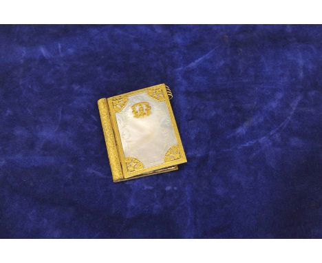 A mother of pearl and gilt mounted pocket book (af). 