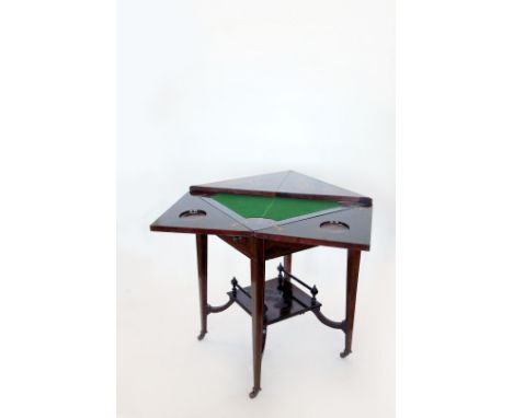 A Victorian marquetry inlaid envelope top card table with frieze drawer, on square tapering line inlaid legs united by a squa